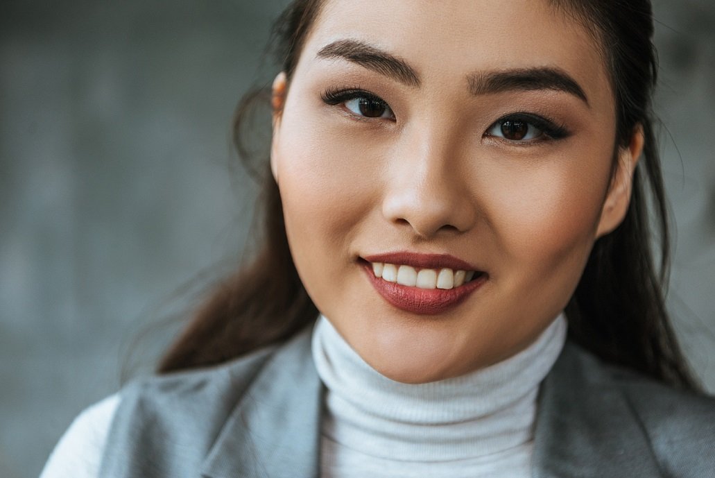 close-up portrait of beautiful young asian woman smiling at camera Advantages of Stem Cell Therapy 2